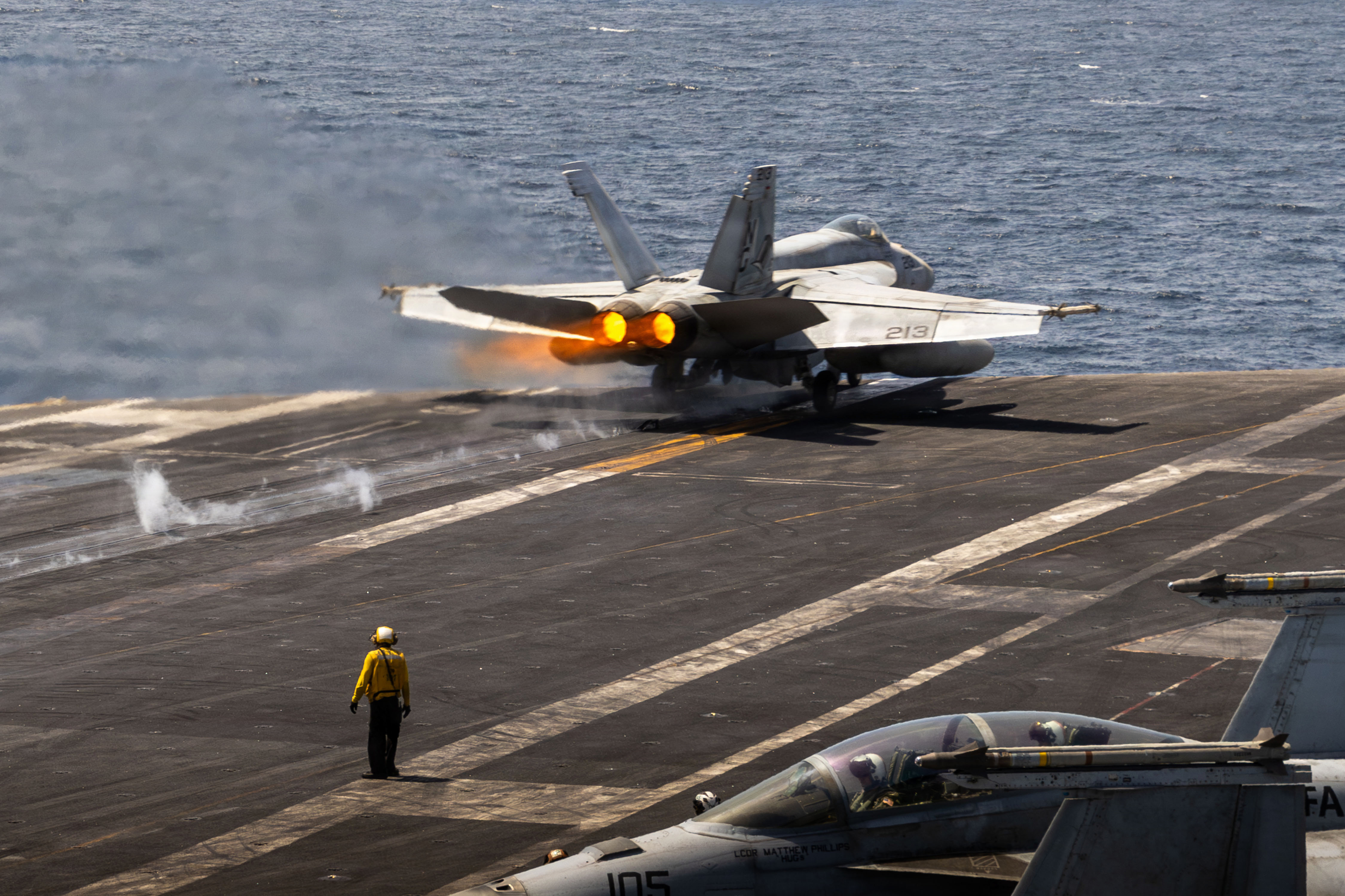 F/A-18 Super Hornet launching from aircraft carrier catapult